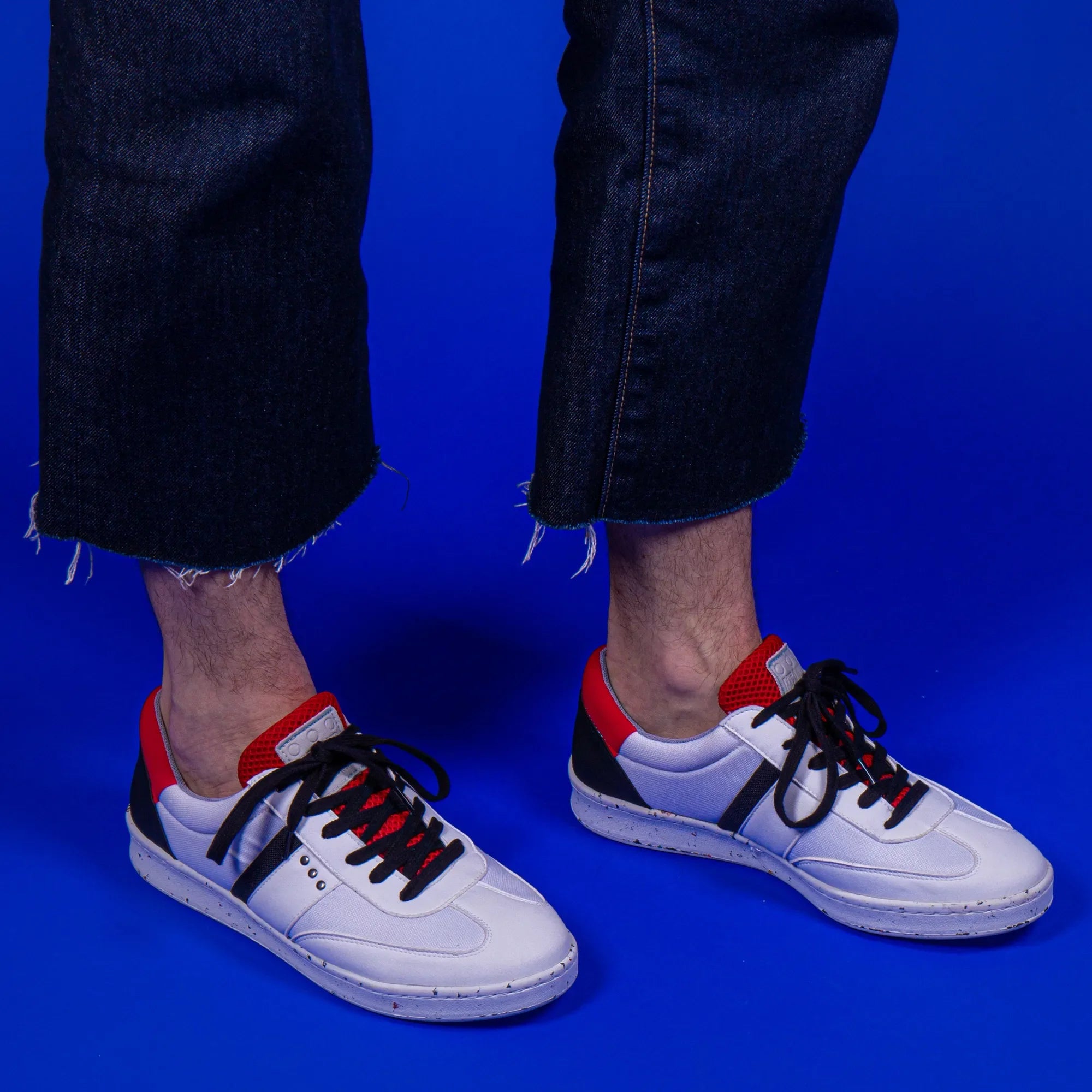 ME.LAND Vivace vegan and recycled sneaker in white, black and red sole