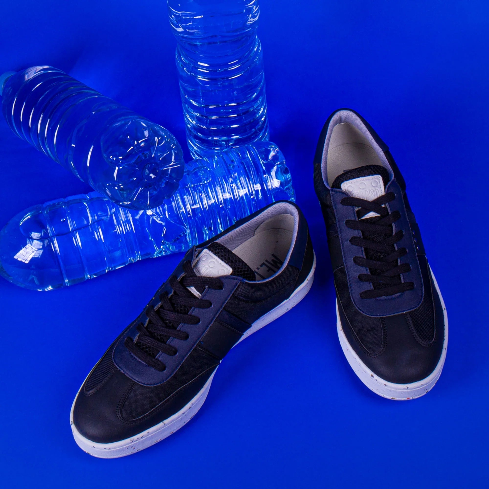 ME.LAND Vivace vegan and recycled sneaker in black and navy blue side view