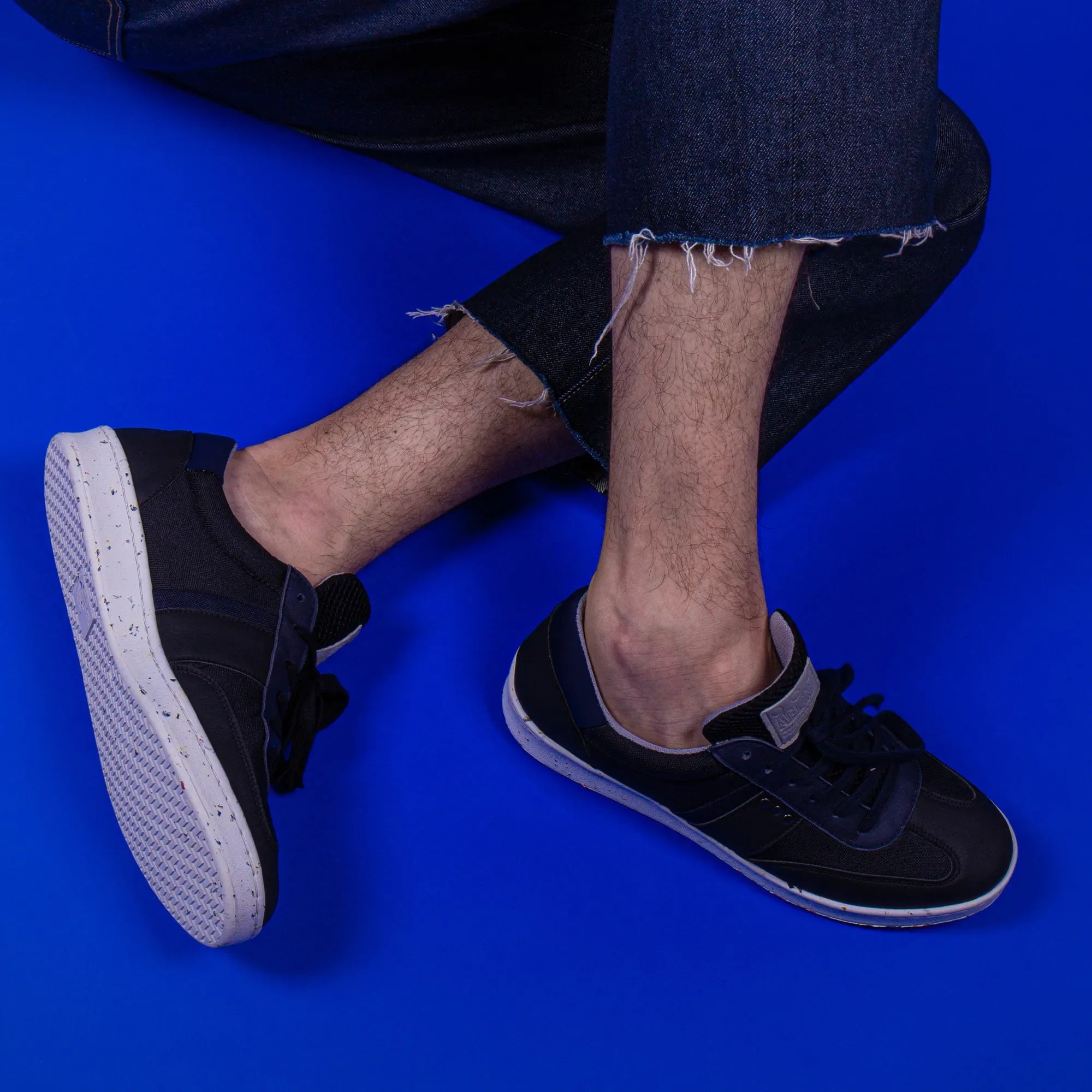 ME.LAND Vivace vegan and recycled sneaker in black and navy blue front and back
