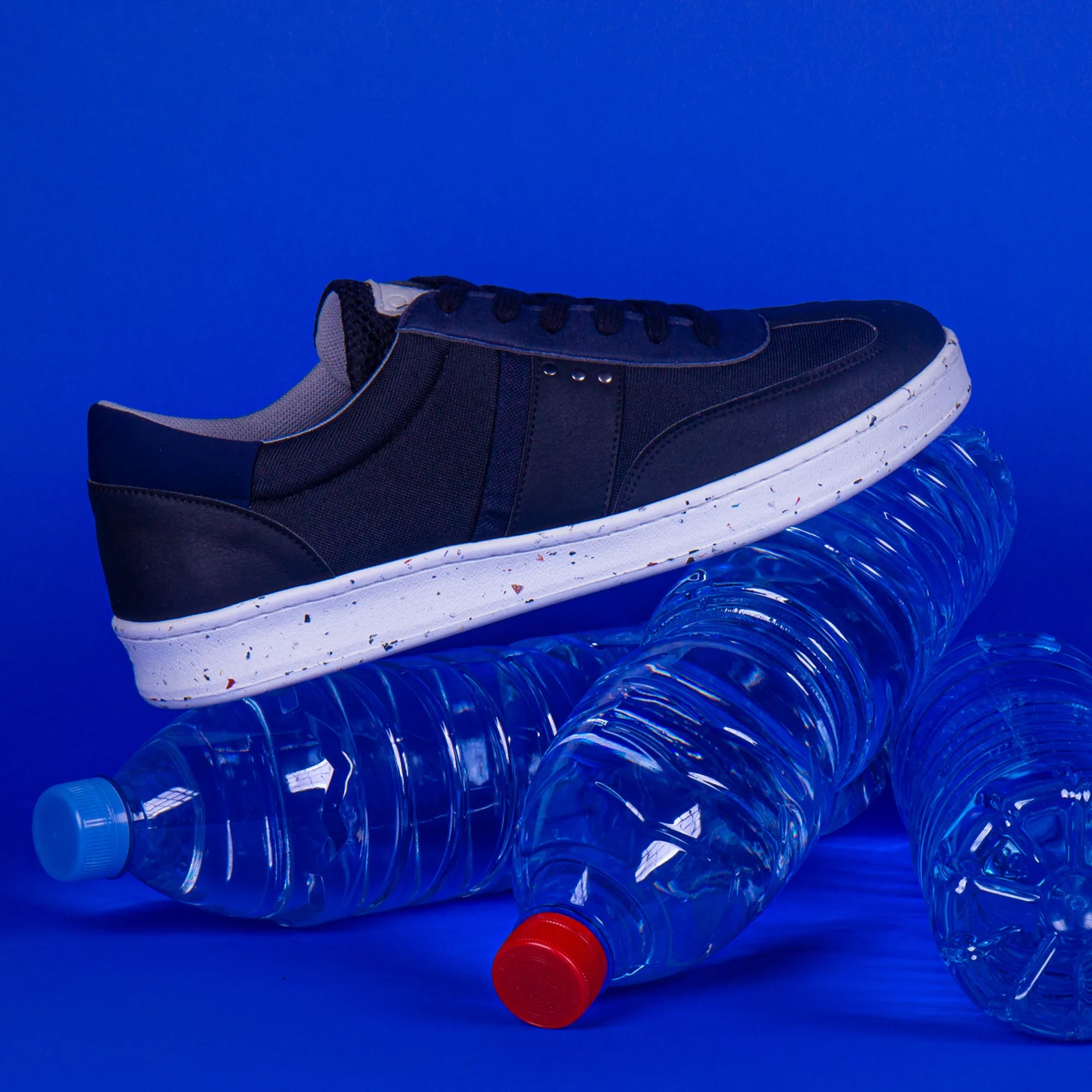 ME.LAND Vivace vegan and recycled sneaker in black and navy blue above