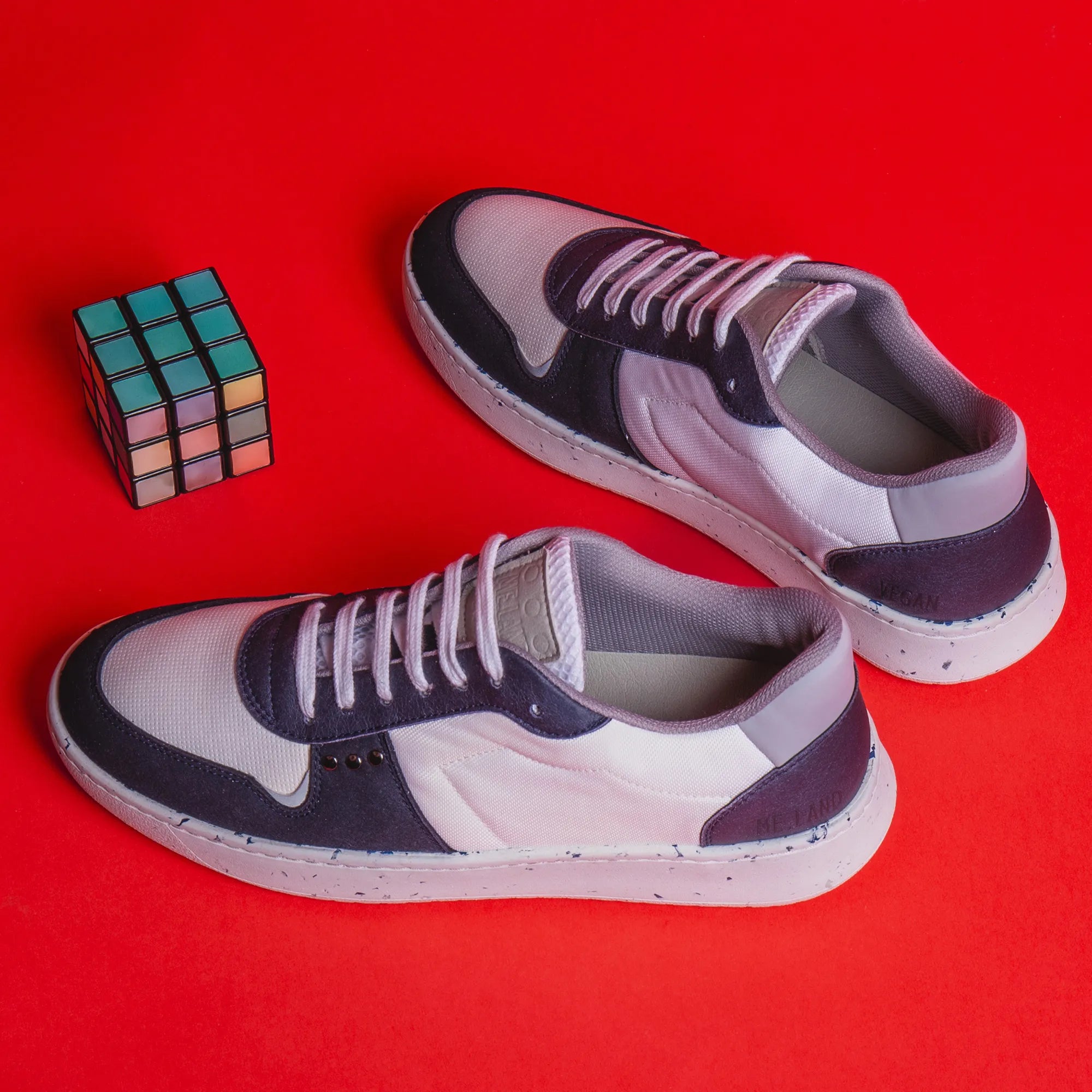 ME.LAND Evan vegan and recycled sneaker in white and navy blue top