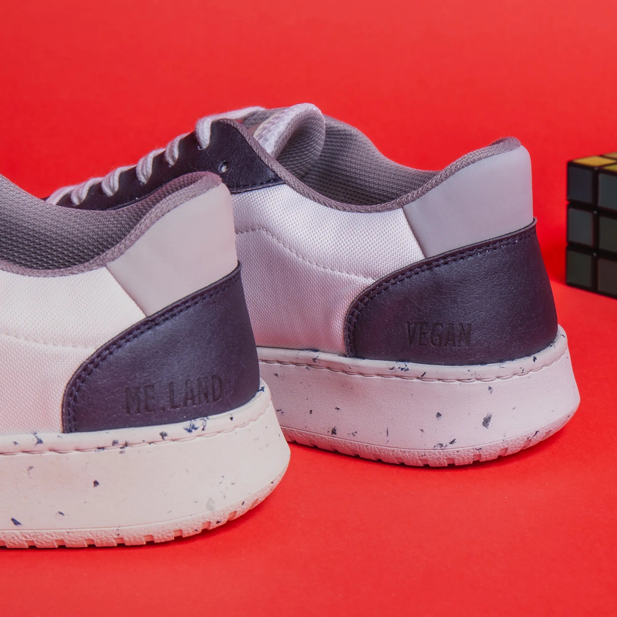 ME.LAND Evan vegan and recycled sneaker in white and navy blue front and back
