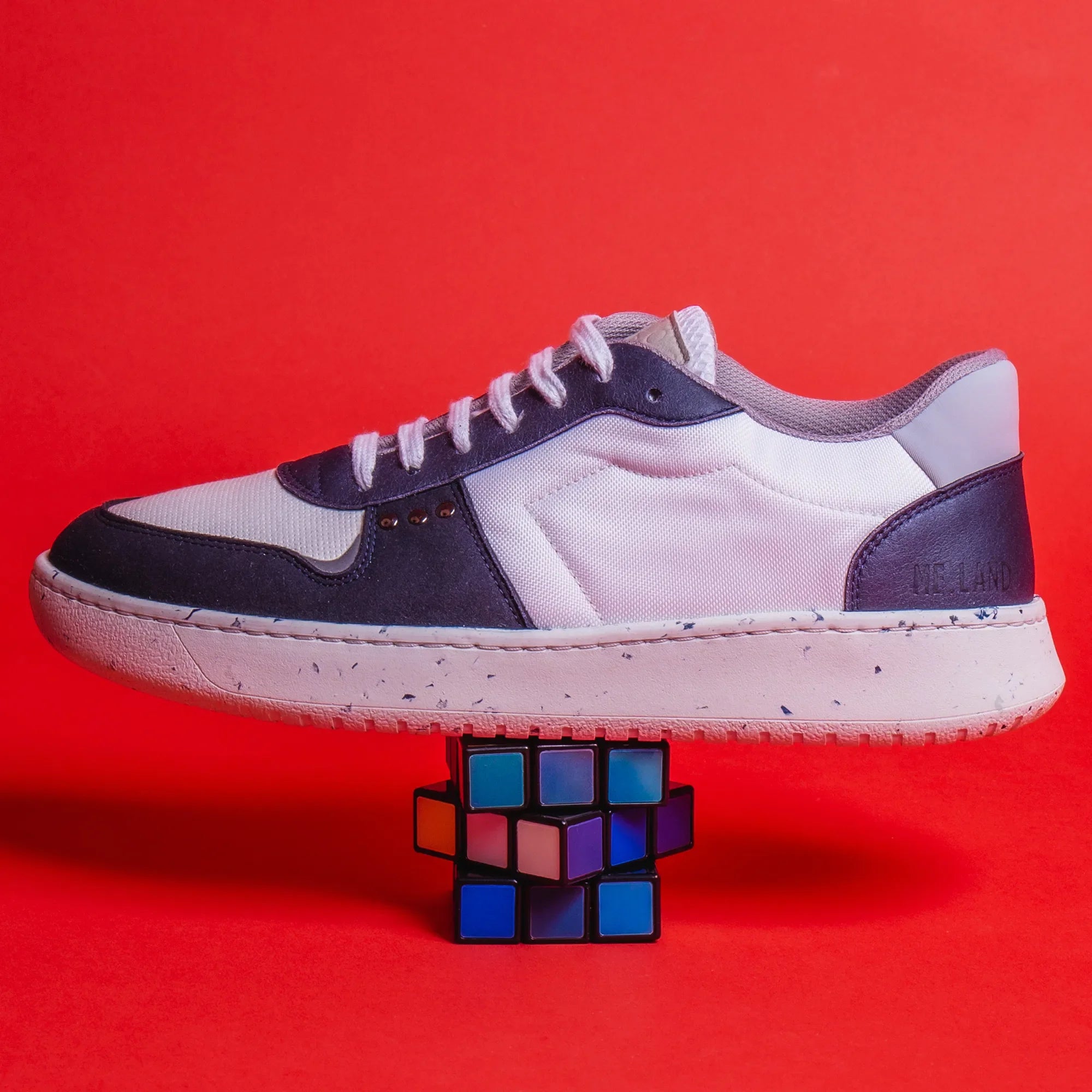ME.LAND Evan vegan and recycled sneaker in white and navy blue side